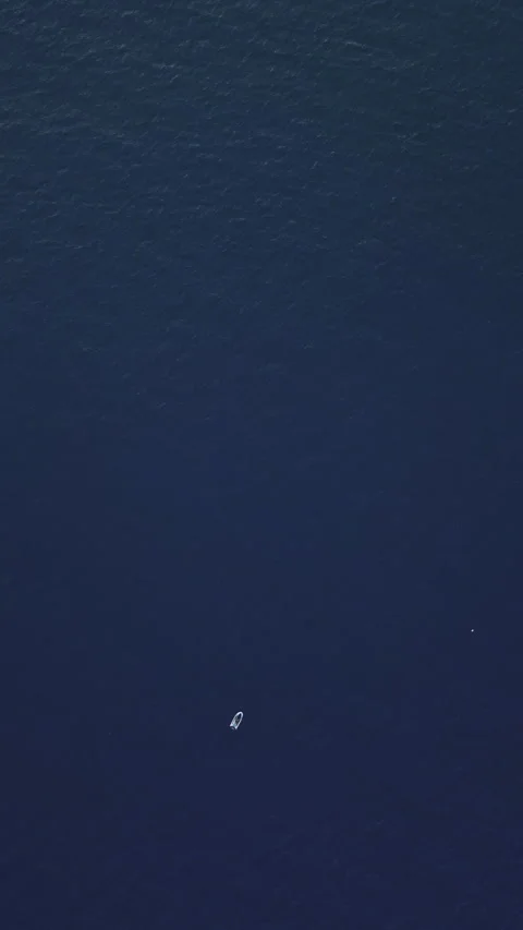 Powerboat turns loop number eight on the sea making infinity future concept Stock Footage 283563045