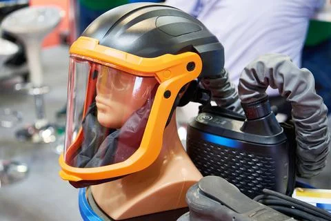 Powered airflow purifying system for work helmet Stock Photos