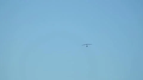Powered para glider in the blue sky 動画素材 143234277