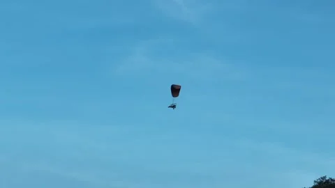 Powered Paraglider Flying In Blue Sky Stock Footage 313062235