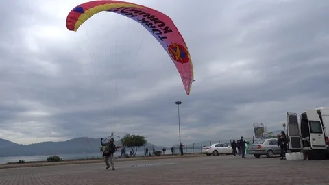 Powered paragliding machine takes off Stock-Footage 86887224