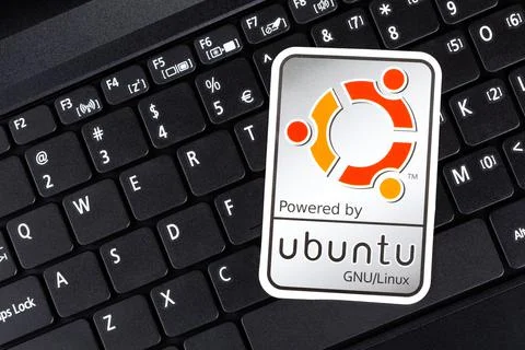 Powered by Ubuntu GNU Linux operating system sticker, logo symbol label closeup Stock Photos
