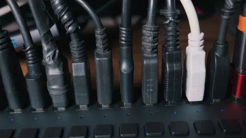 Powered USB Hub with Multiple Cables Connected for Data Transfer Stock Footage 331144719