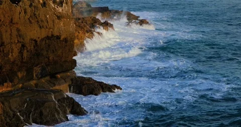 Powerful Atlantic Ocean waves crash against the cliffs of Cascais, Portugal Stock Footage 309654676