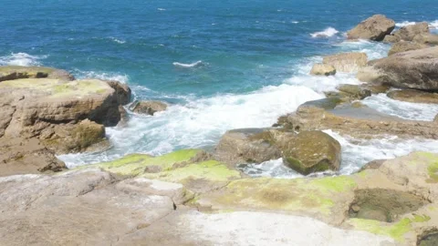 Powerful Atlantic Waves Breaking Over Moss Covered Rocky Coast in Northern S Stock Footage 339687646
