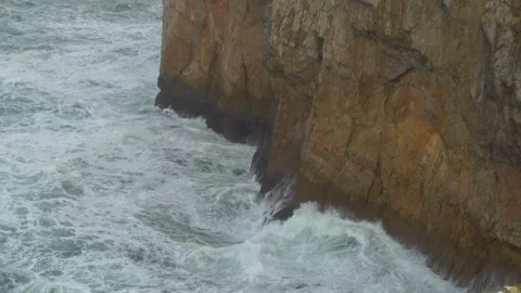 Powerful Atlantic waves crashing on cliffs in Portugal Stock Footage 335645478