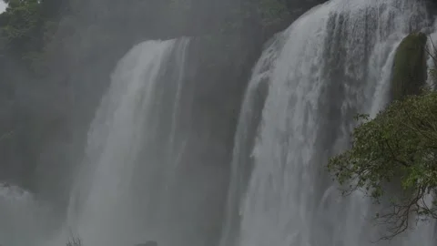Powerful Ban Gioc Double Waterfall With Moss And Overcast Weather Stock Footage 336720817