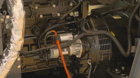 A powerful black diesel generator with a shiny starter, powered by a red wire  스톡 동영상 333327906