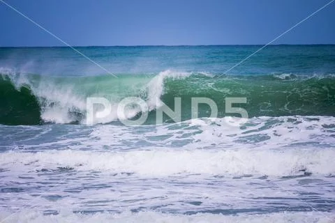 Powerful blue ocean wave with perfect breaking natural background ...
