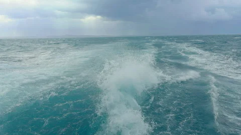 Powerful Boat Wake in Choppy Blue Sea Stock Footage 332621187