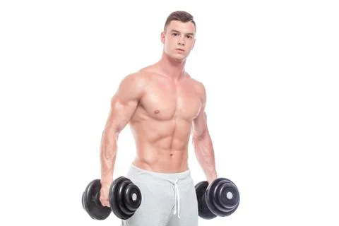 Powerful bodybuilder doing the exercises with dumbbells. Photo of strong male Stock Photos
