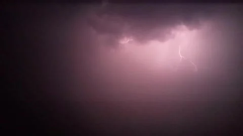 Powerful Branching Thunder Lightning Bolts Striking Across the Dark Purple Night Видео 331057212