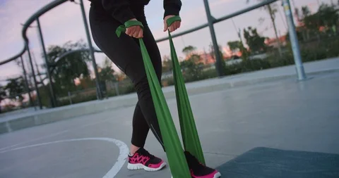 Powerful Caucasian female doing exercise for hands strength muscles at morning Video stock 123663872