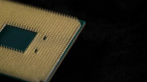 Powerful central processing unit presented in macro. Contact feet are gold Stock Footage 144421258
