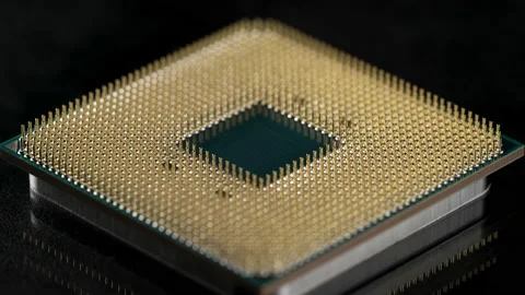 Powerful central processing unit presented in macro. Contact feet are gold Stock Footage 144665705