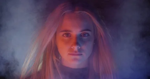 Powerful Close Up Of Smoke Rising Above Beautiful Blonde Model Stock Footage 109226598