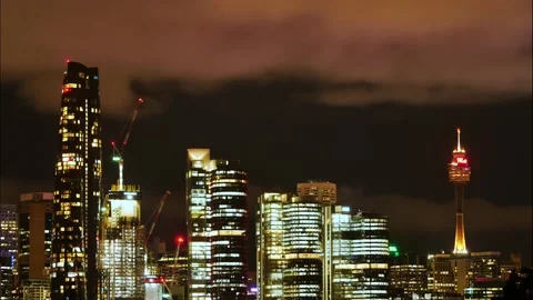 Powerful clouds pass lit up Sydney City time lapse 4K Video stock 166372911