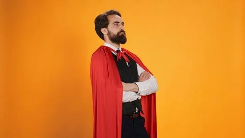 Powerful comic superhero with red cape Foto stock
