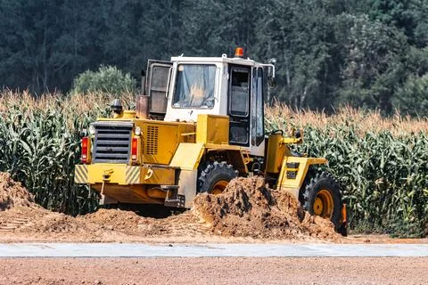Powerful crawler bulldozer close-up at the construction site. Construction eq Photos