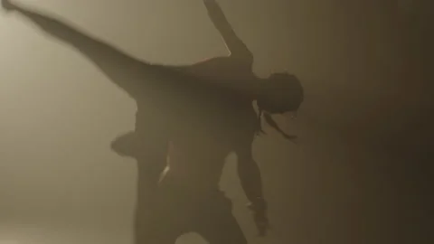 Powerful dance silhouette, displaying strength and energy in movements Stock Footage 235656389