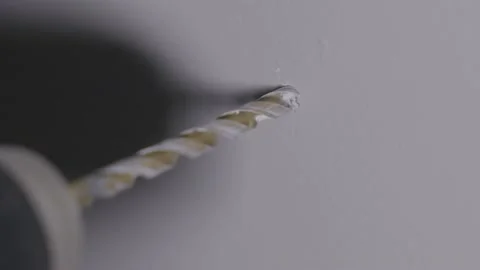 Powerful Electric Drill Makes Hole In Wall Close Up Slow Motion Stock Footage 144904913