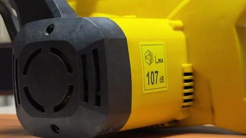 Powerful Electric Saw Engine Roars To Life With a Piercing High-Decibel Scream Stock Footage 329015583