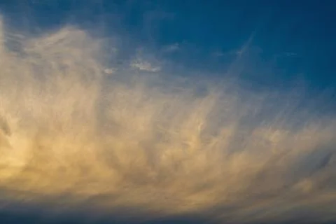A powerful element of wind disperses clouds across the sky. The element of ai Stock Photos