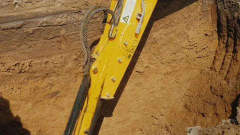 Powerful excavator digs a deep hole. Stock Footage 143315097