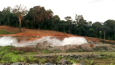 Powerful explosion in a quarry. The destruction of hard rock with a explosion. Stock Footage 245272687