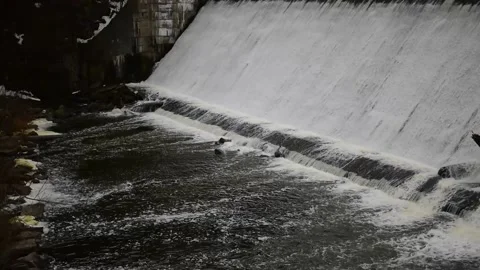 Powerful falling river water down from the dam Stock Footage 149891531