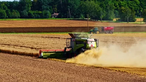 Powerful farming machine working efficiently on a large agricultural field Stock Footage 315269459
