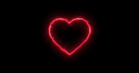 A powerful Fiery fire laser etching a burning outline of a heart shape out .. Stock Footage 330530135