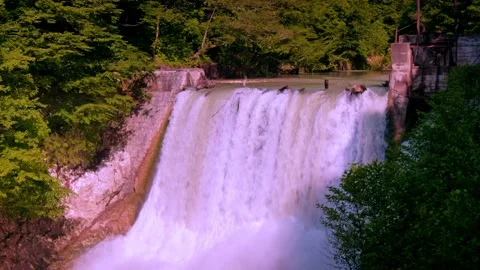 Powerful flow of falling water Stock Footage 234963768