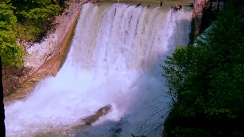 Powerful flow of falling water Stock Footage 234963908