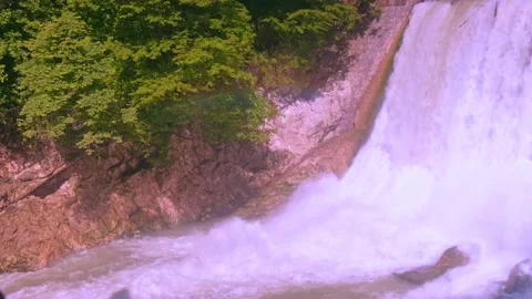 Powerful flow of falling water Stock Footage 234964545