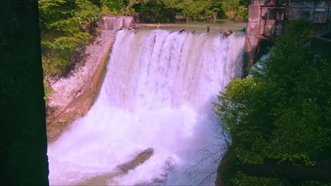 Powerful flow of falling water Stock Footage 234964721