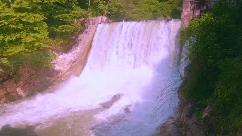 Powerful flow of falling water Stock Footage 234964935