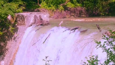 Powerful flow of falling water Stock Footage 234965873