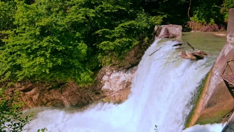 Powerful flow of falling water Stock Footage 234968086