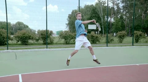 Powerful forehand. Spectacular shot with professional tennis player. SlowMo Video stock 58282571