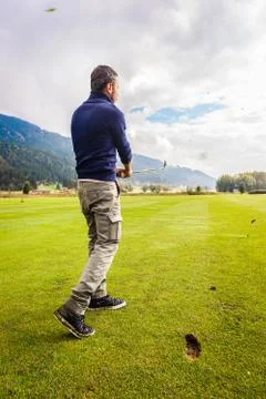 Powerful golf swing 写真素材