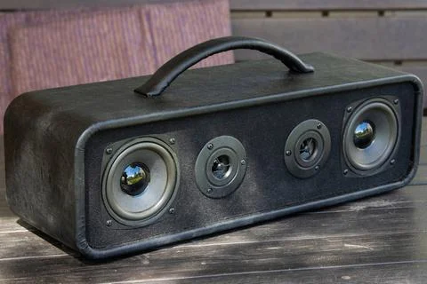 Powerful handmade bluetooth speaker in the backyard of a country house Stock Photos