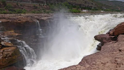 Powerful Hukou Waterfall Rushing Down The Yellow River In China 스톡 동영상 347067071