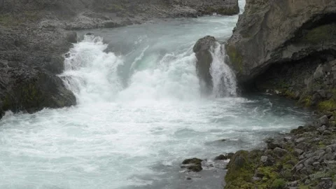 Powerful Icelandic River Rapids Flowing Through Rugged Basalt Rocks 4K Nature Video stock 339810351