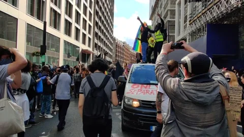 POWERFUL IMAGES BLM ACTIVISTS ON VAN DANCING AND CHANTING IN LONDON RALLY, 4K Stock Footage 133204305
