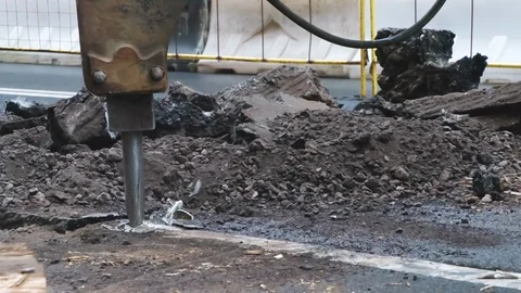 Powerful Jackhammer Breaks the Asphalt HD Pro Stock Footage 122624434