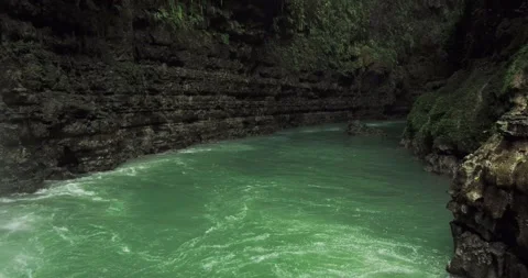 Powerful Jungle River Flow Through Narrow Canyon with Rock Formations Stock Footage 332607005