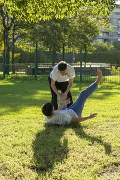 Powerful kicks in a dedicated Jiu Jitsu practice Stock Photos