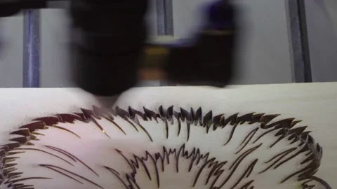 Powerful laser machine capable of cutting and engraving on wood and other non Stock Footage 141748019