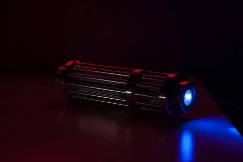 Powerful laser pointer, blue laser capable of burning paper and leaving burns Stock Photos